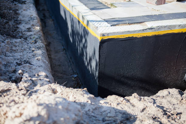 Professional Waterproofing technician working in Suring, WI